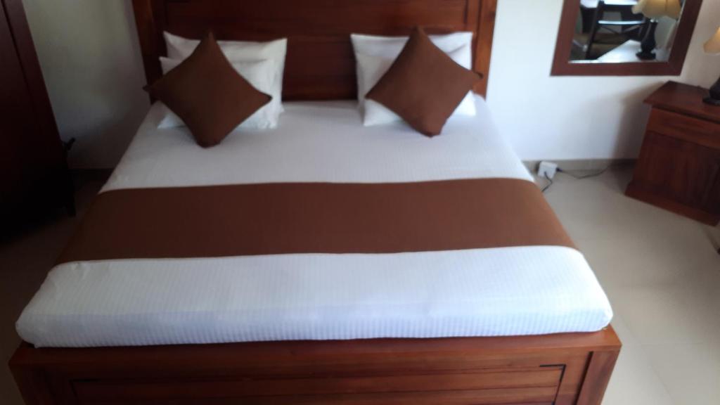 Postel nebo postele na pokoji v ubytování Jal,Min Homestay
