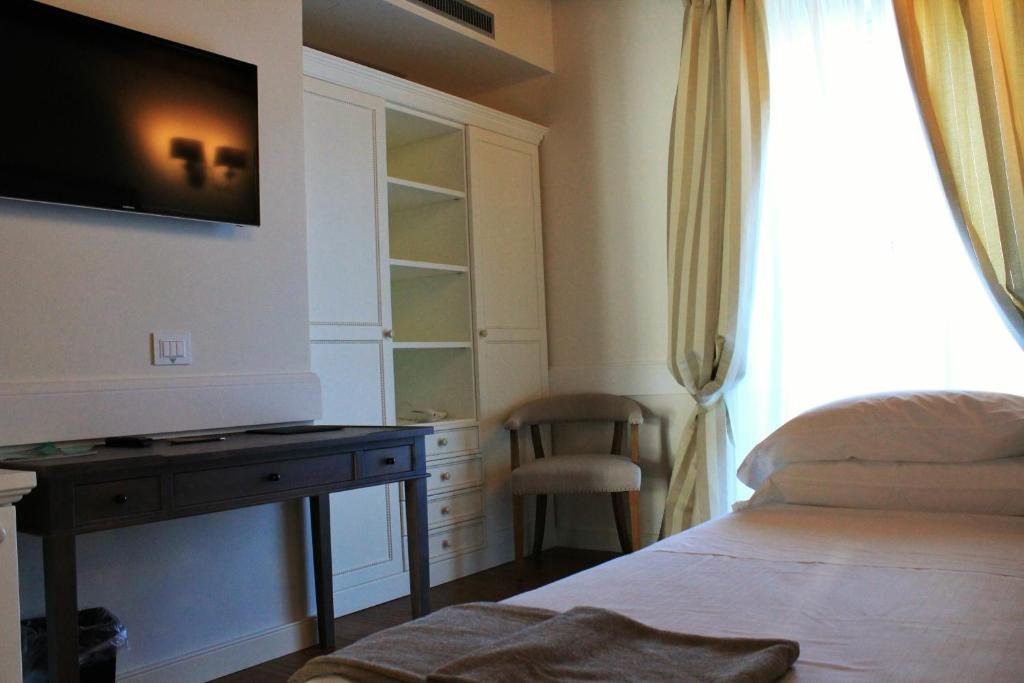 Televízia a/alebo spoločenská miestnosť v ubytovaní San Giovanni Relais
