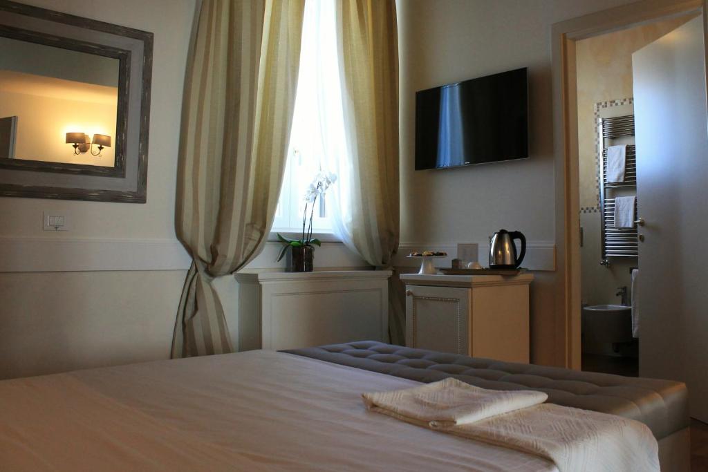 Posteľ alebo postele v izbe v ubytovaní San Giovanni Relais