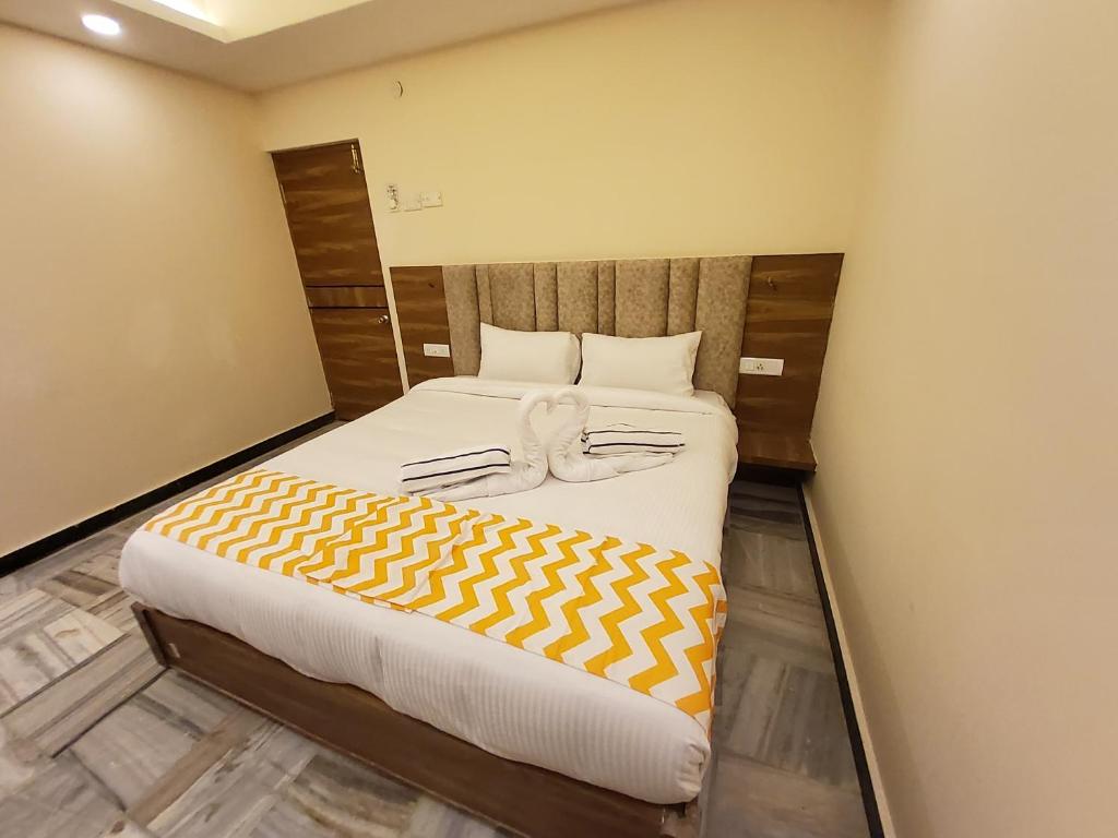 Postel nebo postele na pokoji v ubytování GT Grande Hotel-Near US Consulate