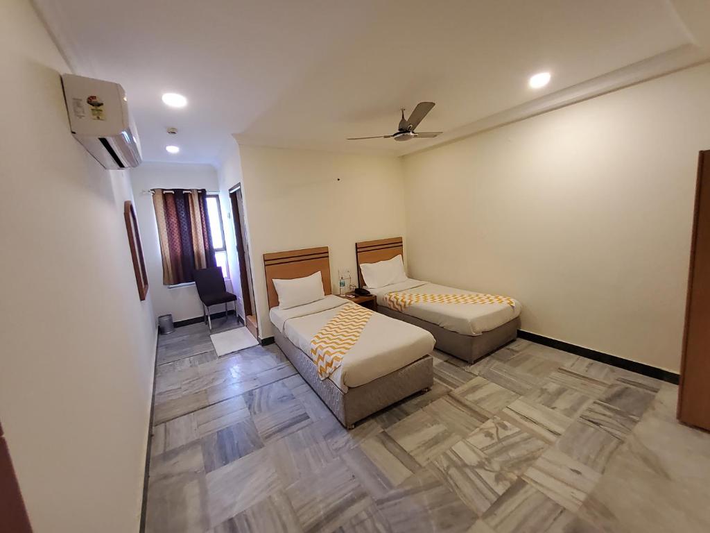 Postel nebo postele na pokoji v ubytování GT Grande Hotel-Near US Consulate