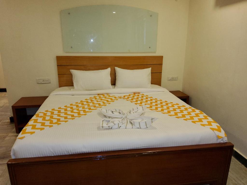 Postel nebo postele na pokoji v ubytování GT Grande Hotel-Near US Consulate