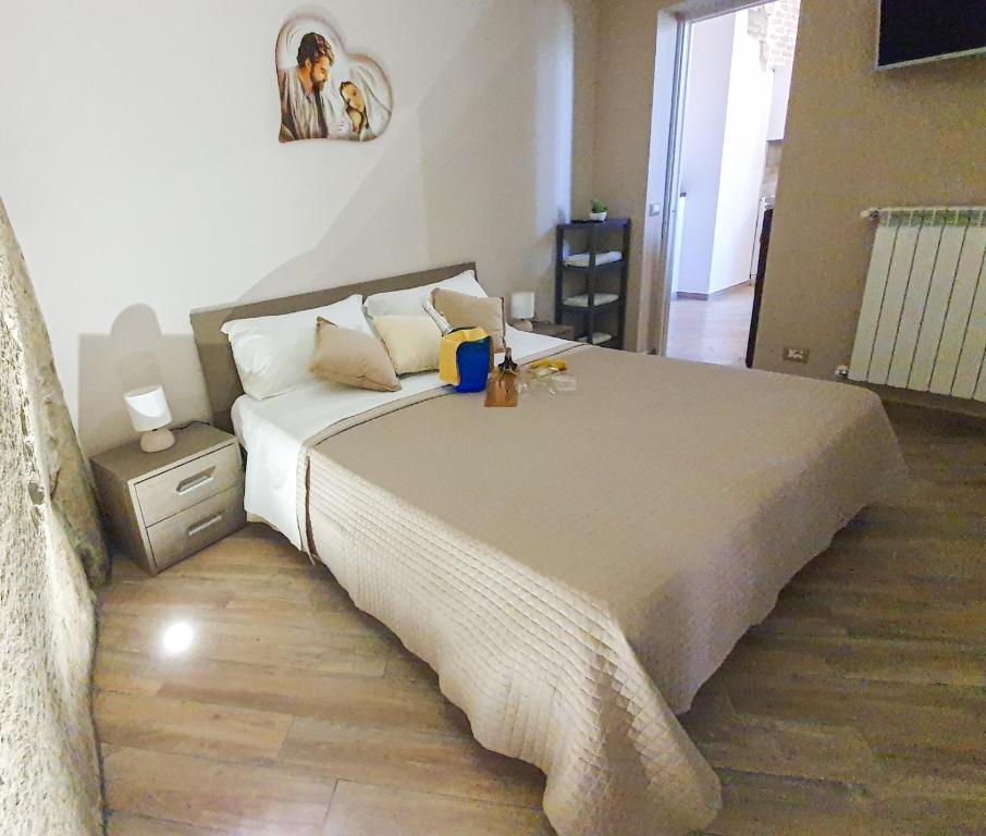Postel nebo postele na pokoji v ubytování B&B L'Arenaria