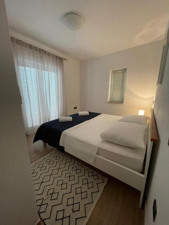 Posteľ alebo postele v izbe v ubytovaní Apartment Frina II, Island Hvar