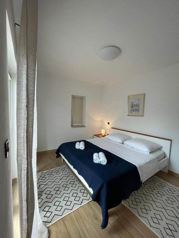 Posteľ alebo postele v izbe v ubytovaní Apartment Frina II, Island Hvar