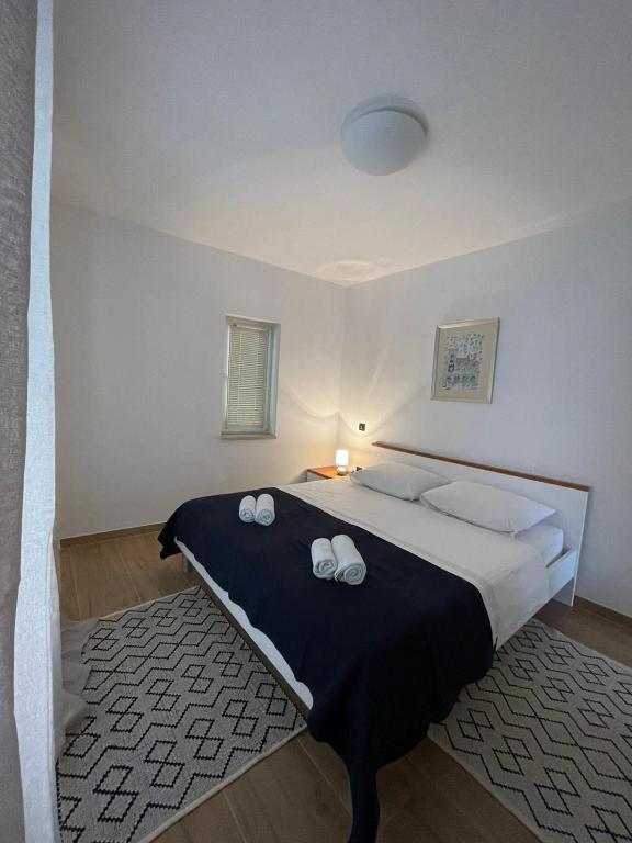 Posteľ alebo postele v izbe v ubytovaní Apartment Frina II, Island Hvar