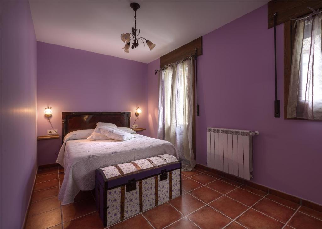 A bed or beds in a room at Paloma