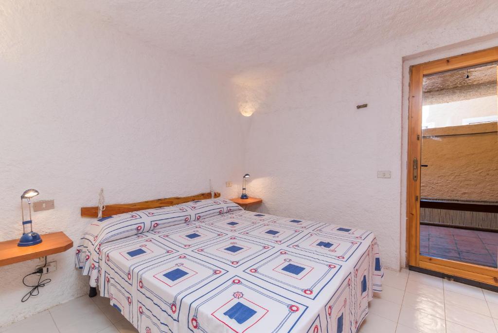 A bed or beds in a room at Domus Mea