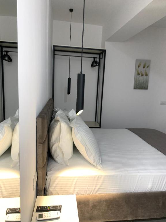 Ένα ή περισσότερα κρεβάτια σε δωμάτιο στο Kekezis Apartments