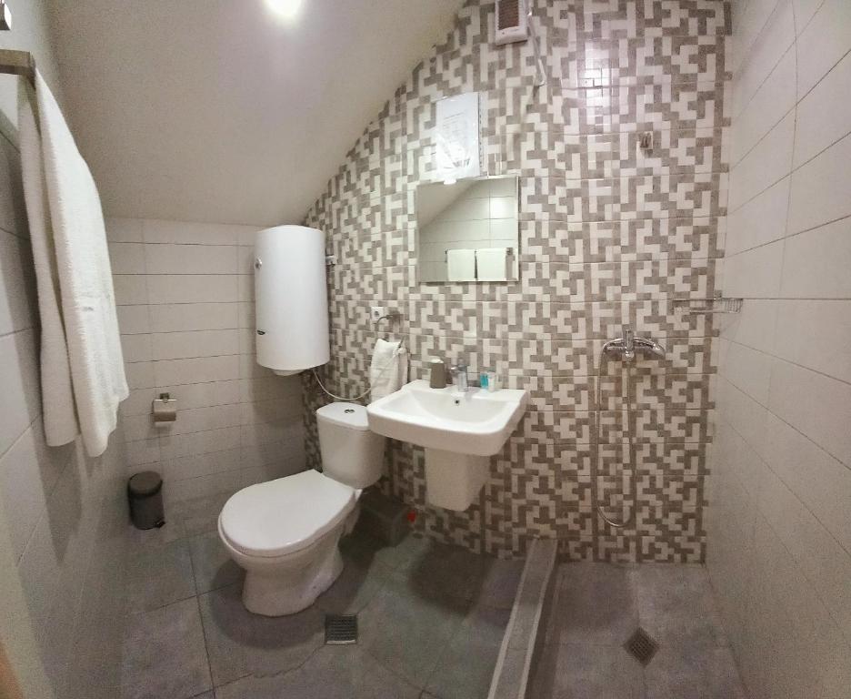 Koupelna v ubytování Hotel Lile