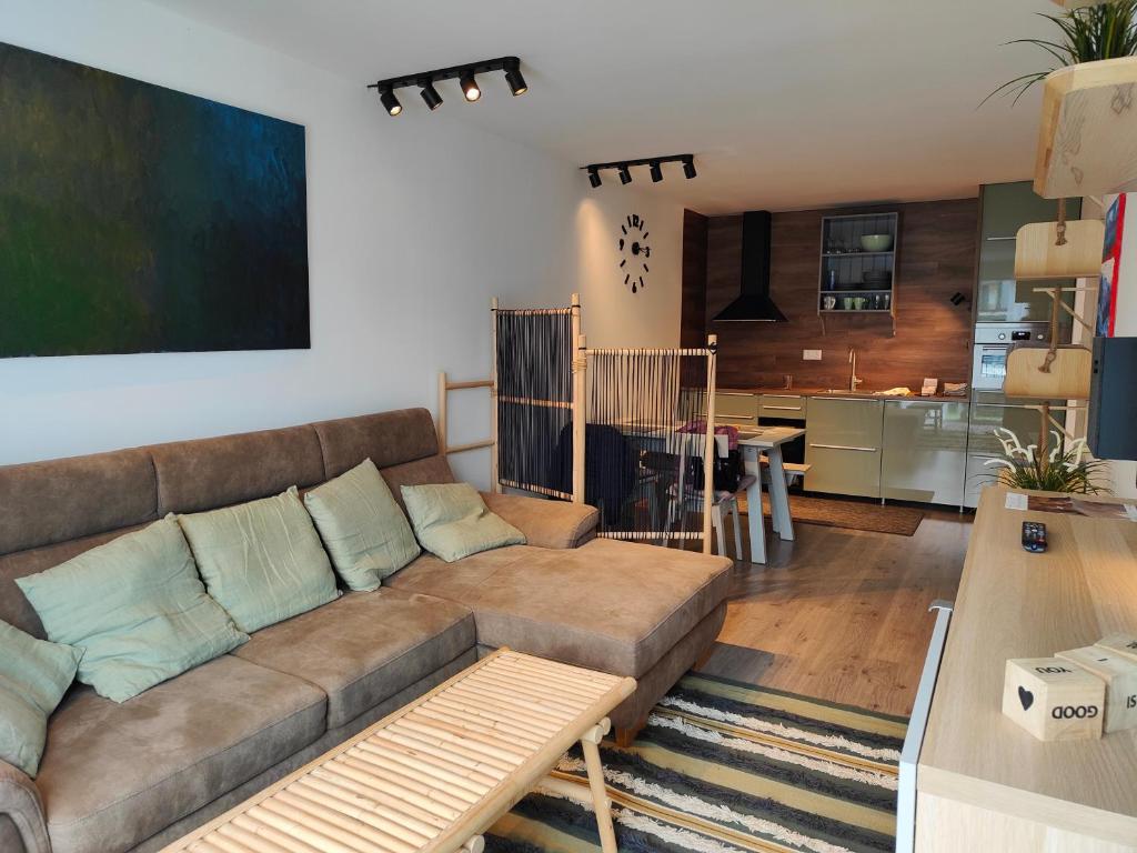 A kitchen or kitchenette at Beachfront Paradise Ezüst Panoráma lakeview apartment with panoramic terrace