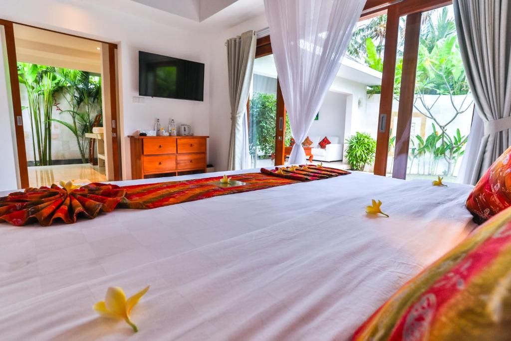 Postel nebo postele na pokoji v ubytování Jivana Resort