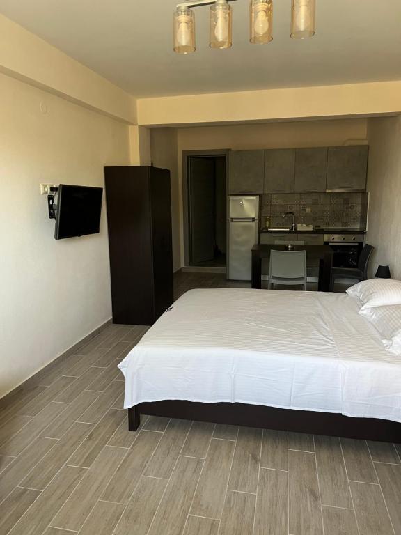 Postel nebo postele na pokoji v ubytování Bivas Apartments