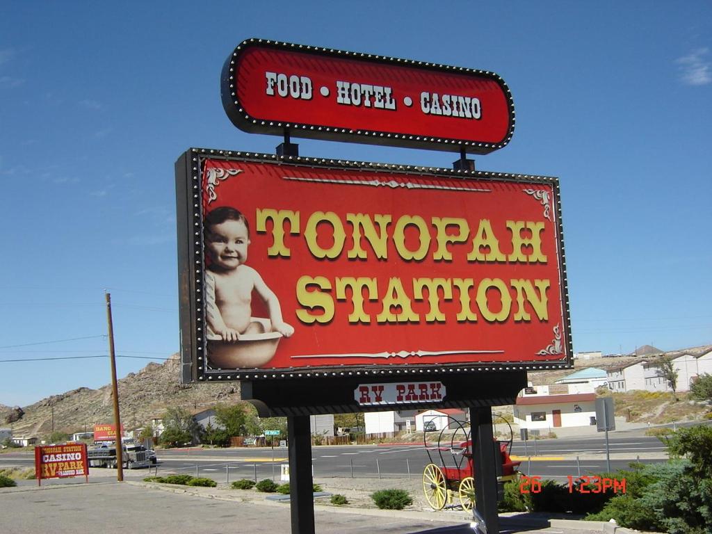 a sign for a moroccan station on a street at Tonopah Station Hotel and Casino in Tonopah