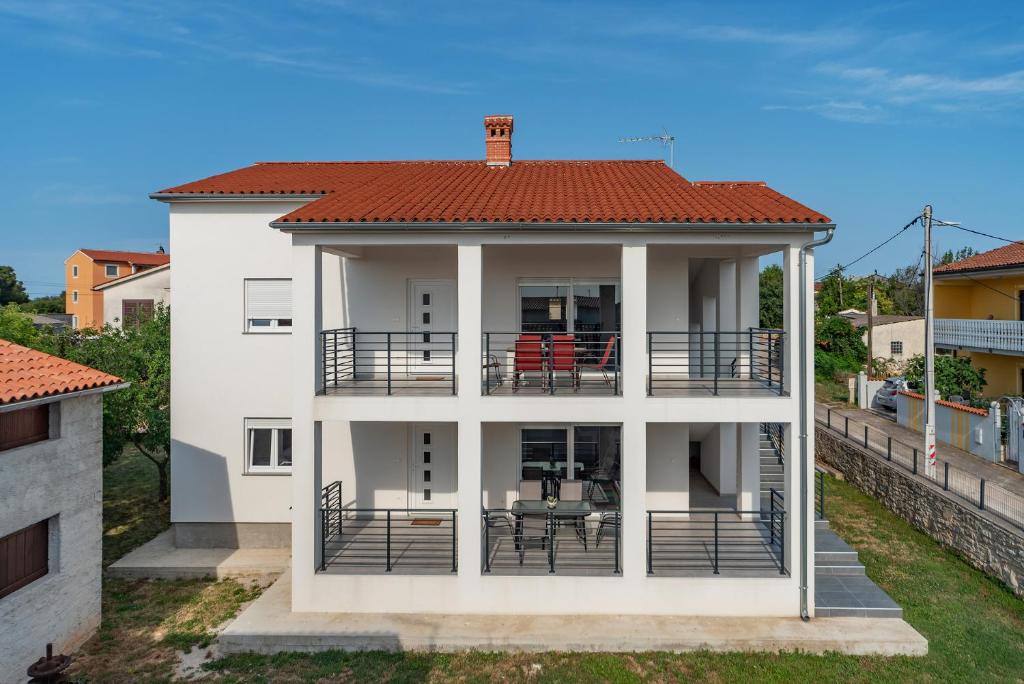 Balkón nebo terasa v ubytování VILLA ALEXANDRIA