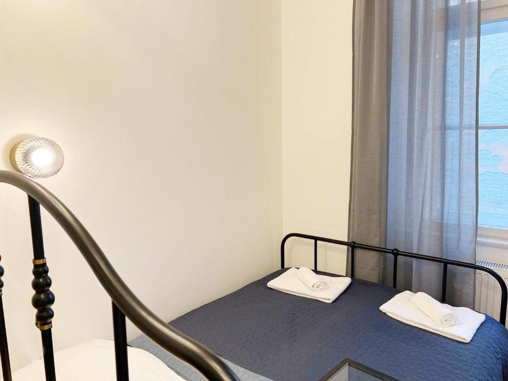 Postel nebo postele na pokoji v ubytování Tyrsova design apartments
