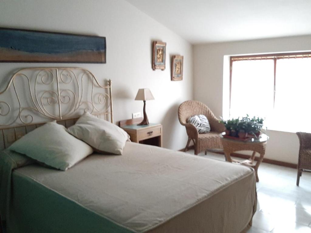 Postel nebo postele na pokoji v ubytování Villa Isabel 2 Llaves