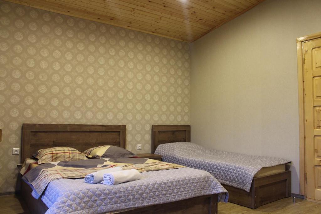 Postelja oz. postelje v sobi nastanitve Likani-house's Cottage