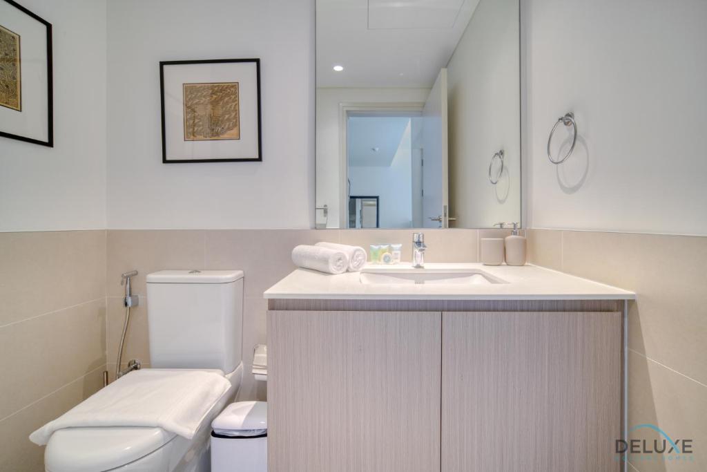 Koupelna v ubytování Graceful 1BR at Park Heights Dubai Hills MBR City by Deluxe Holiday Homes