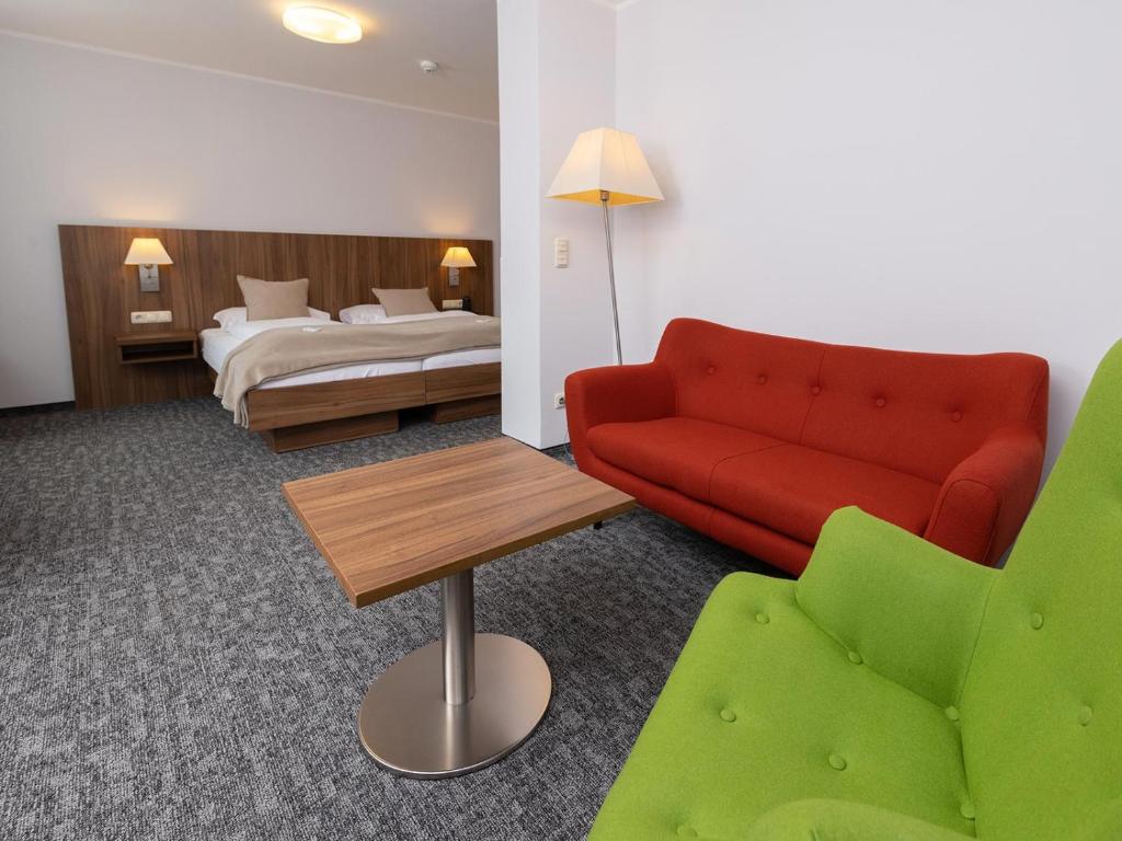 Postel nebo postele na pokoji v ubytování Seehotel im Weyer