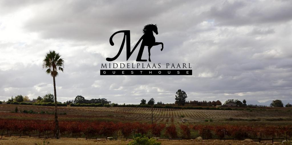 a sign for a michelinas plant with a horse on it at Middelplaas Paarl Guesthouse in Paarl
