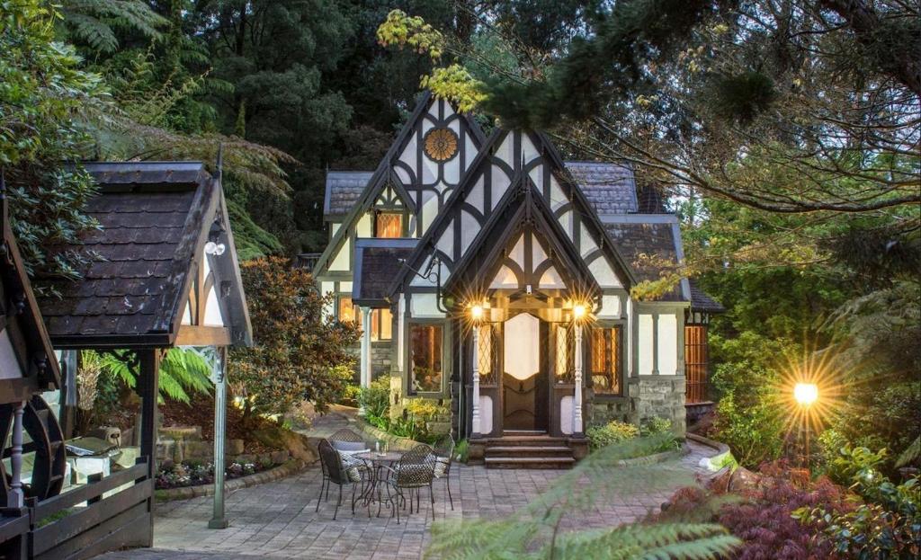 a home with a gothic style house at Fernhill Estate “ Gingerbread House” in Kallista