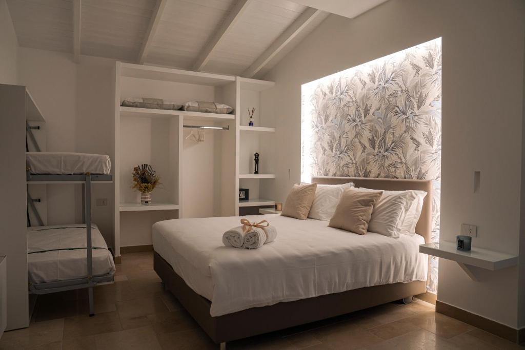 Кровать или кровати в номере Otto Apulia House B&B