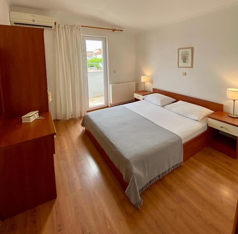 Postel nebo postele na pokoji v ubytování Villa Adria
