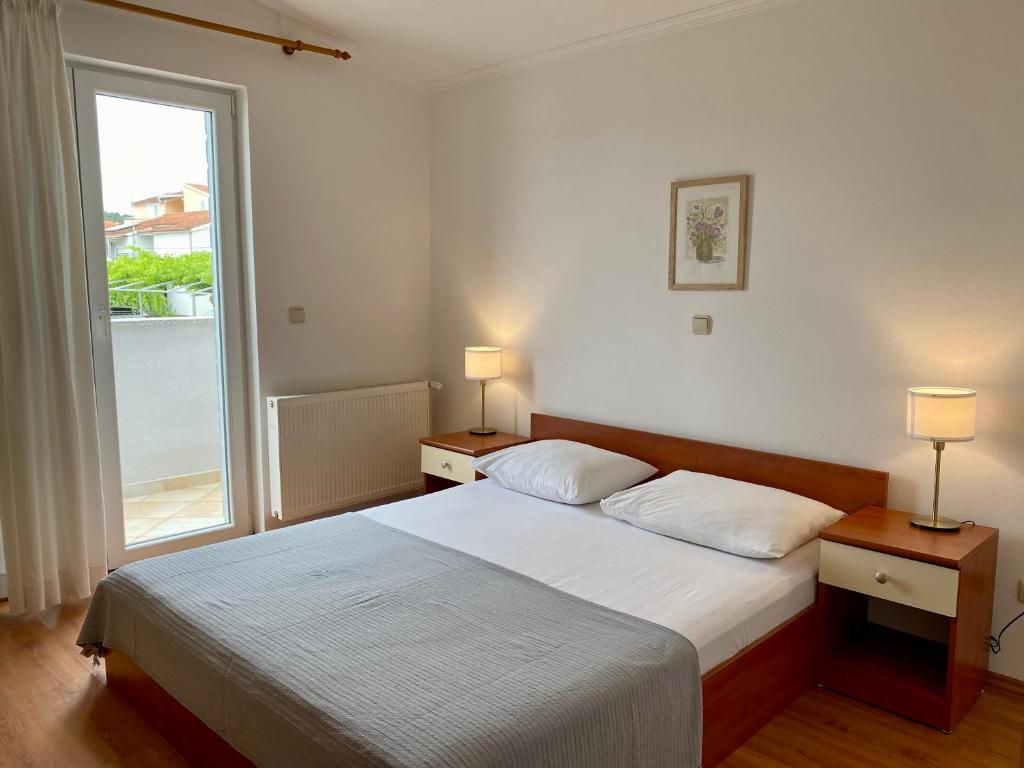Postel nebo postele na pokoji v ubytování Villa Adria