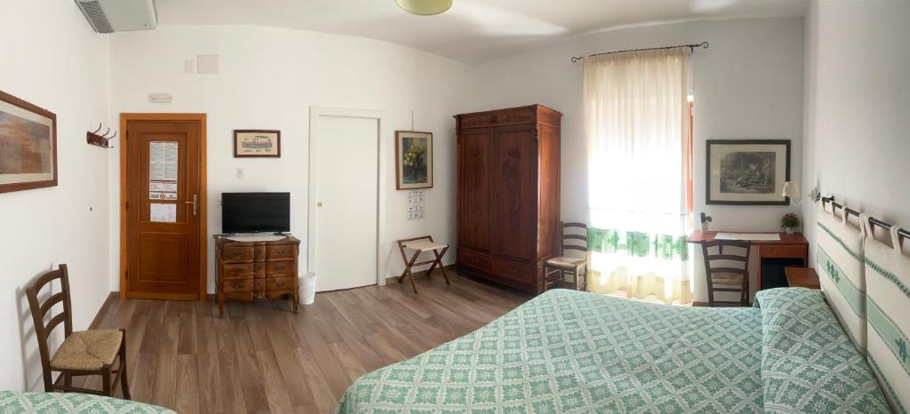 TV a/nebo společenská místnost v ubytování Su Corittu Guesthouse