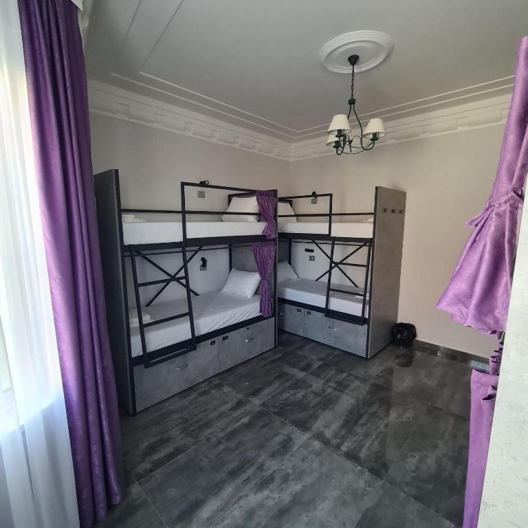 Postel nebo postele na pokoji v ubytování Up Hostel