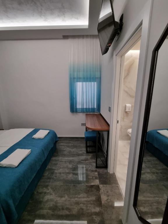 Postel nebo postele na pokoji v ubytování Up Hostel