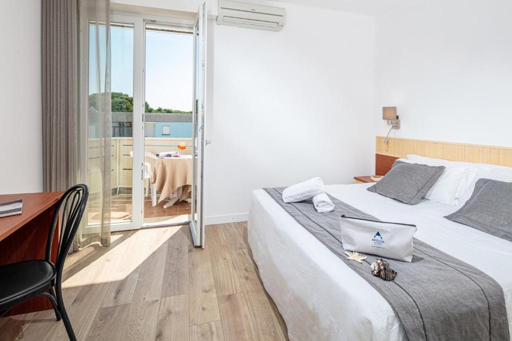 Postel nebo postele na pokoji v ubytování Hotel Villa d'Este