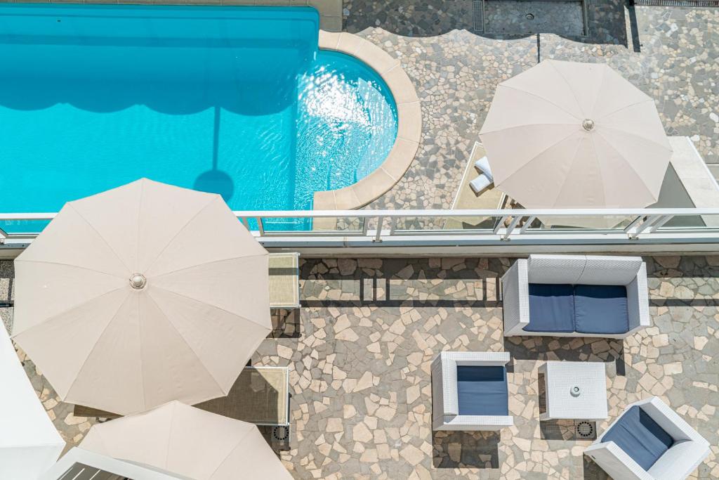 Bazén v ubytování Hotel Villa d'Este nebo v jeho okolí