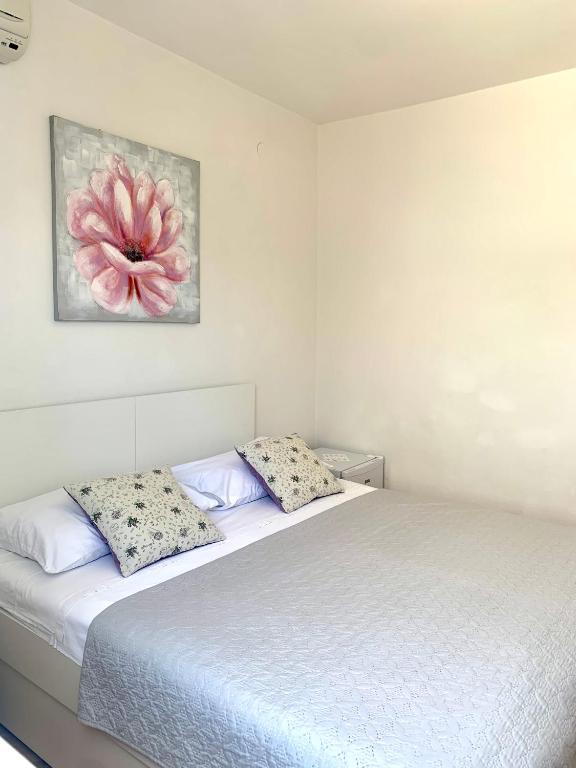 Posteľ alebo postele v izbe v ubytovaní Apartments Nikola Stipišić