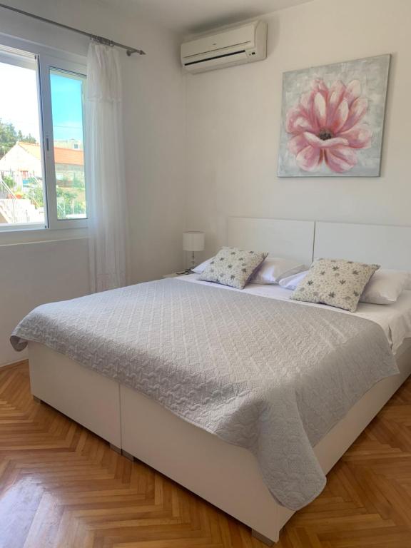 Posteľ alebo postele v izbe v ubytovaní Apartments Nikola Stipišić