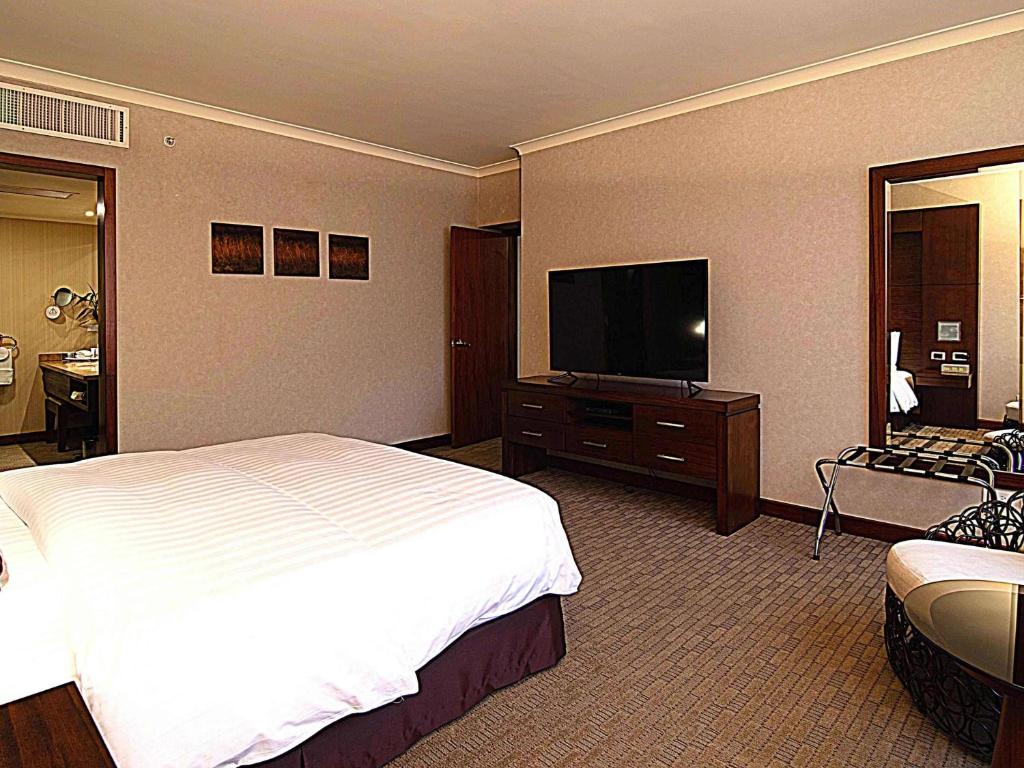 TV a/nebo společenská místnost v ubytování Swissotel Quito