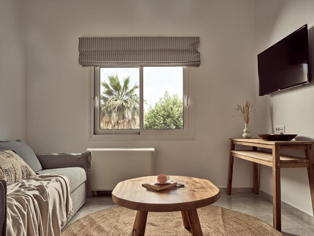 TV a/nebo společenská místnost v ubytování Margie Sea View Apartment