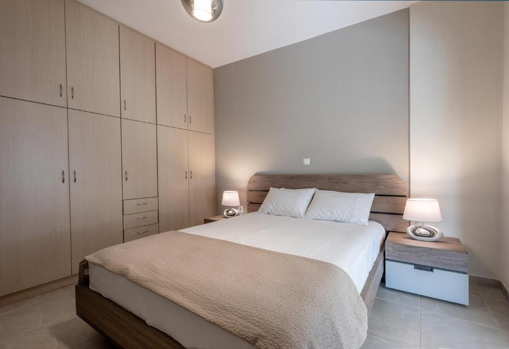 A bed or beds in a room at AMELIA HOUSE