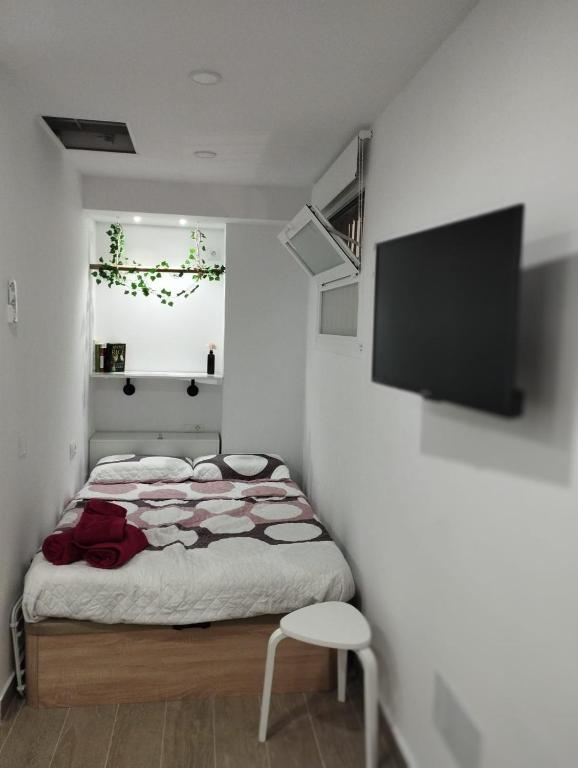 Postel nebo postele na pokoji v ubytování LOFT LA CASITA