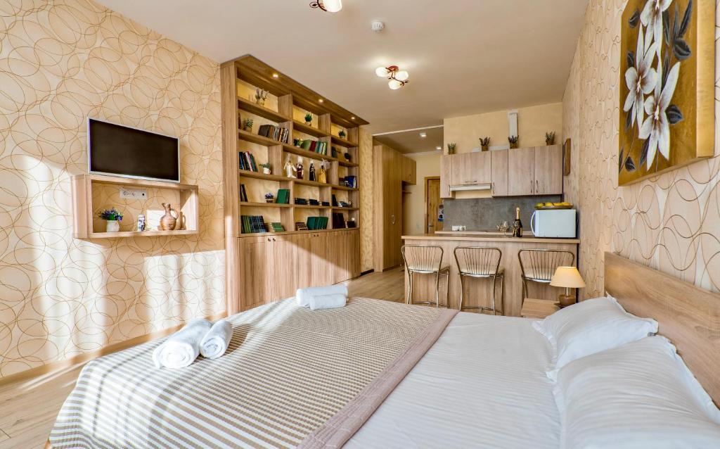 Kuchyň nebo kuchyňský kout v ubytování Studio Apartment NFT New Gudauri 108