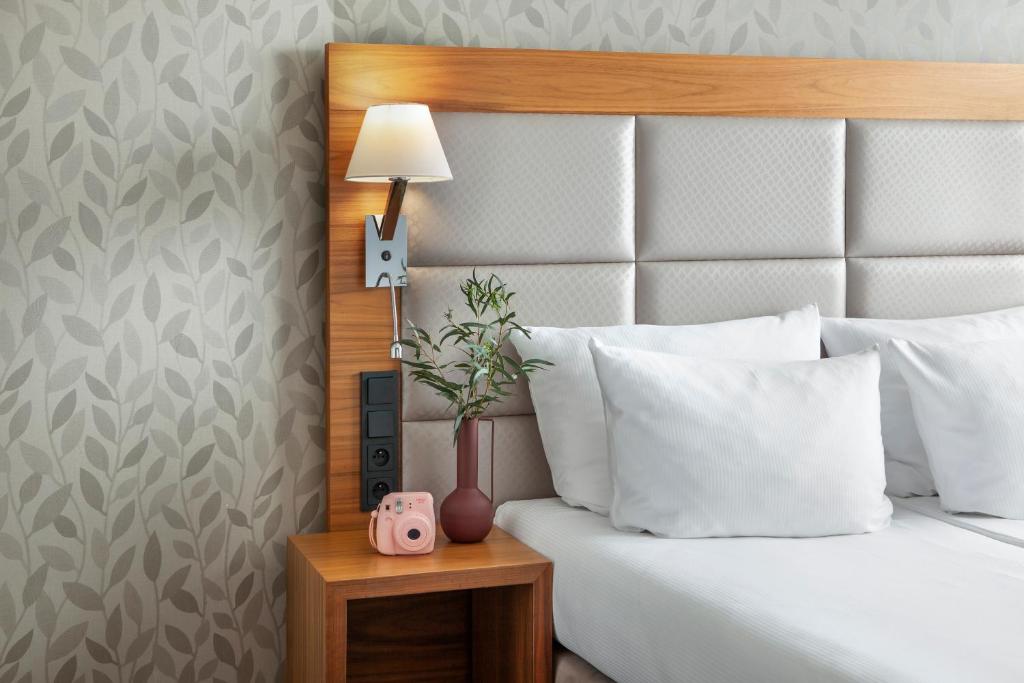 Postel nebo postele na pokoji v ubytování Sea Premium Apartments - Destigo Hotels