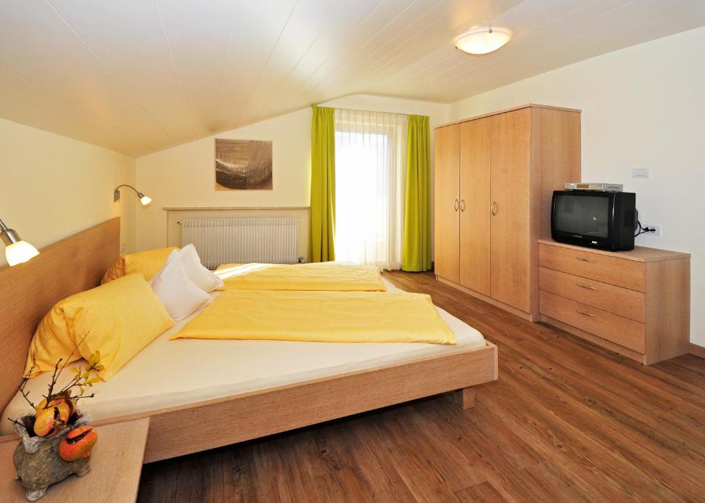 TV a/nebo společenská místnost v ubytování Residence Mignon