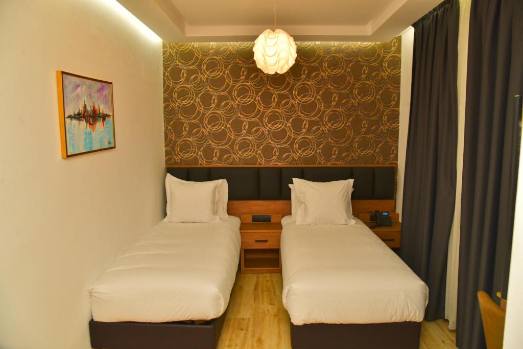 Postel nebo postele na pokoji v ubytování Surf One Hotel