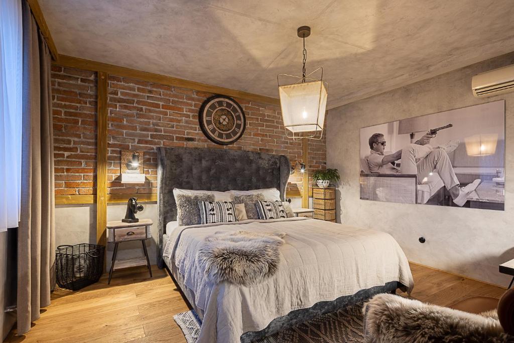Postel nebo postele na pokoji v ubytování Hotel McLimon