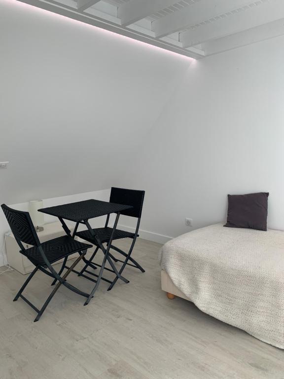 Posteľ alebo postele v izbe v ubytovaní Blue bay studio terrasse