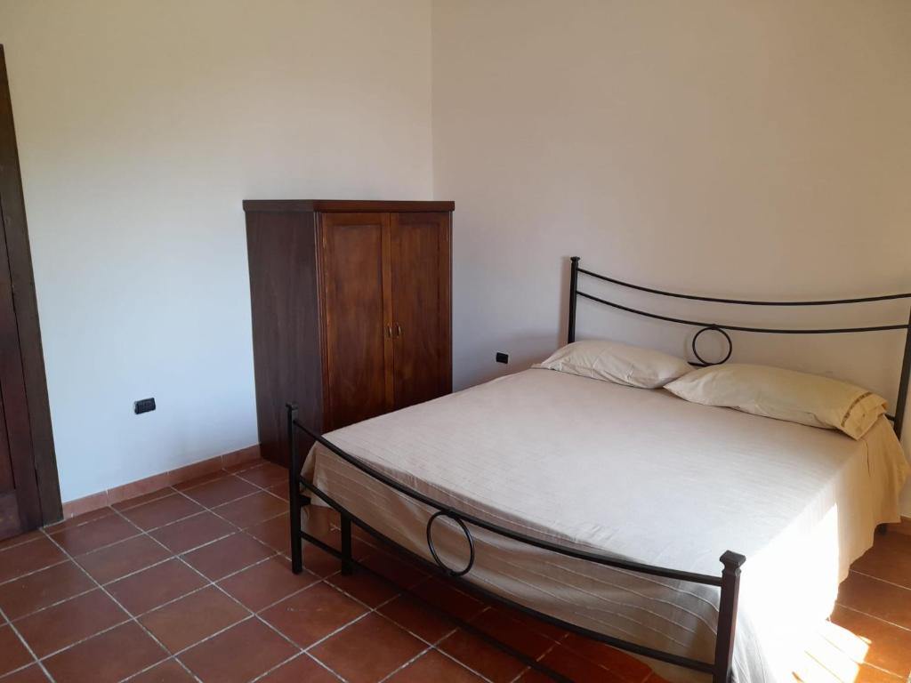 A bed or beds in a room at Villa Mattia