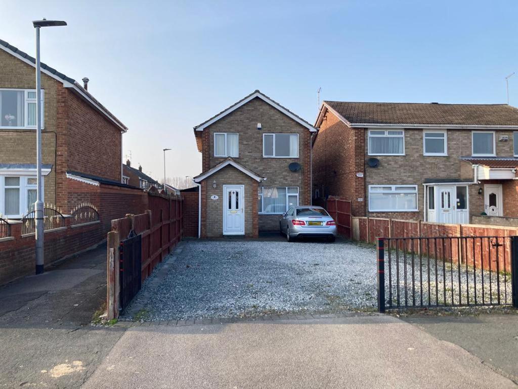 a house with a car parked in the driveway at Hullidays East Modern Detached 3 Bed House in Hull