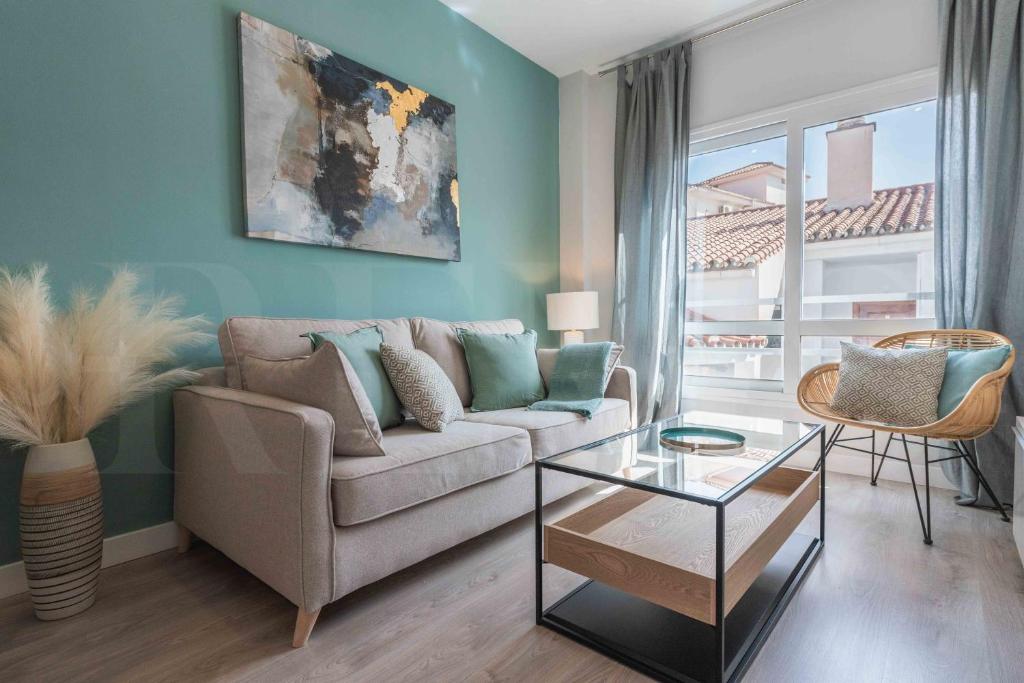 A seating area at Sunny & modern apartment - Center by REMS
