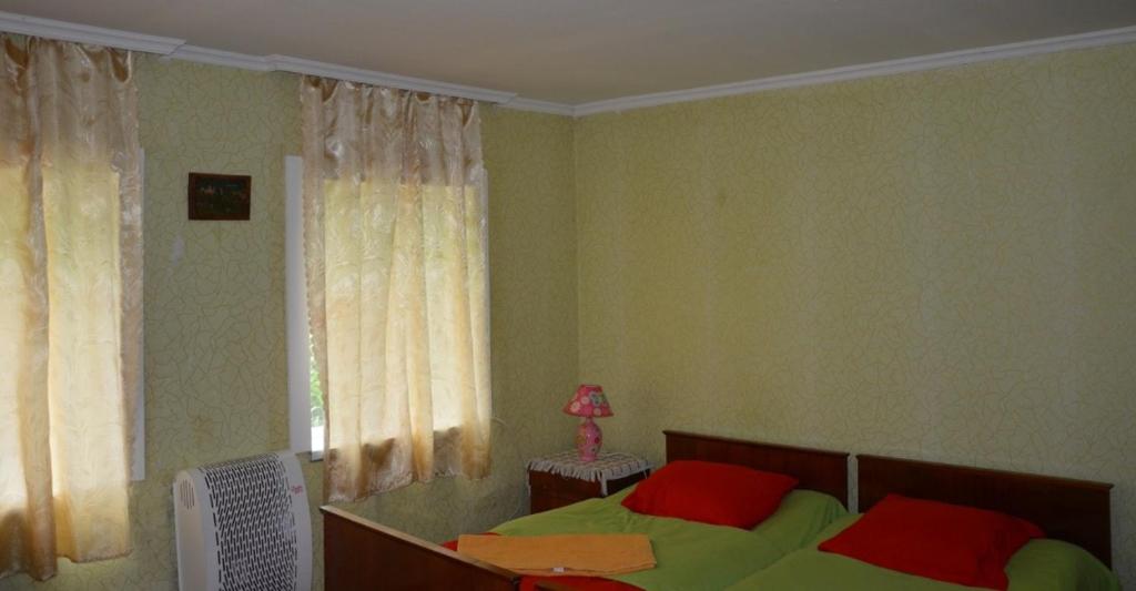Postel nebo postele na pokoji v ubytování Guesthouse Gegi
